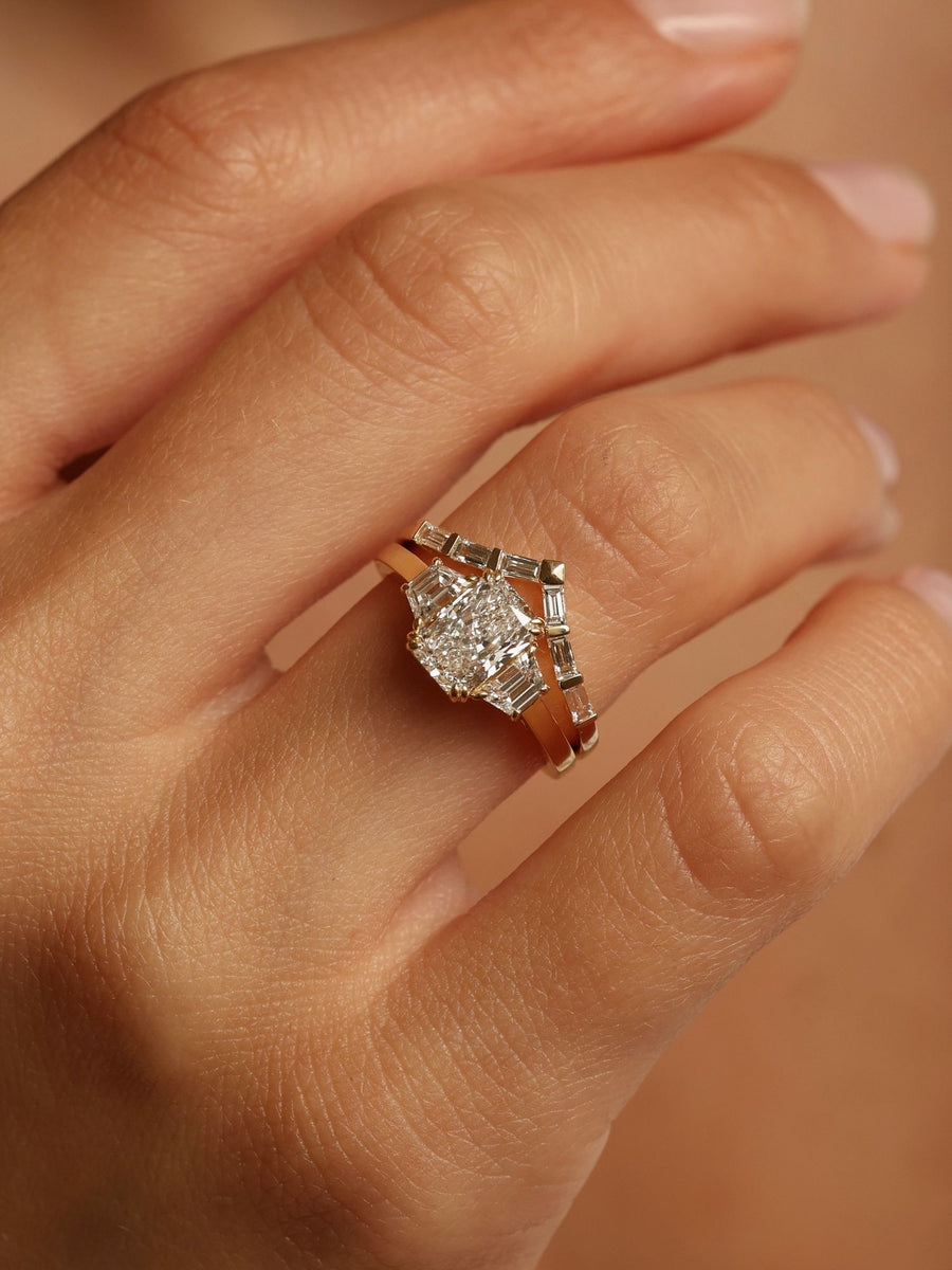 Radiant cut lab grown diamond three stone engagement ring, 1.0 to 3.0 carats, set in elegant prong setting on gold band
