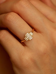 Radiant cut lab grown diamond three stone engagement ring, 1.20 to 3.20 carats, set in prong design on polished gold band