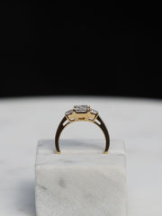 Radiant cut lab grown diamond three stone engagement ring, 1.0 to 3.0 carats, set in elegant prong setting on gold band