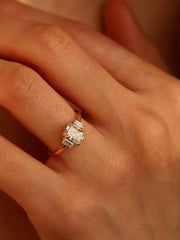 Radiant cut lab grown diamond three stone engagement ring, 1.20 to 3.20 carats, set in prong design on polished gold band