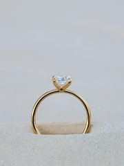 Radiant cut lab grown diamond solitaire engagement ring, 1.50 to 3.50 carats, in a classic prong setting on polished gold band