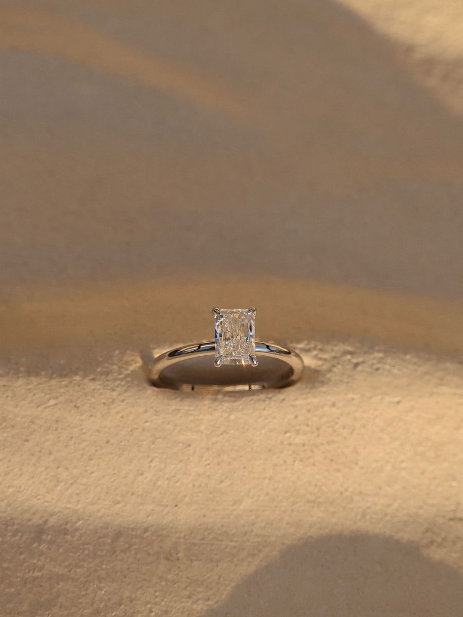 Radiant cut lab grown diamond solitaire engagement ring, 1.50 to 3.50 carats, in a classic prong setting on polished gold band