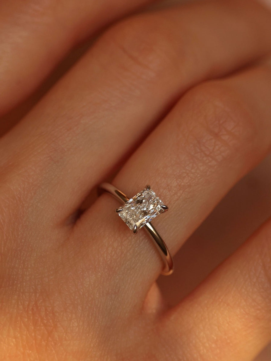 Radiant cut lab grown diamond solitaire engagement ring, 1.50 to 3.50 carats, in a classic prong setting on polished gold band