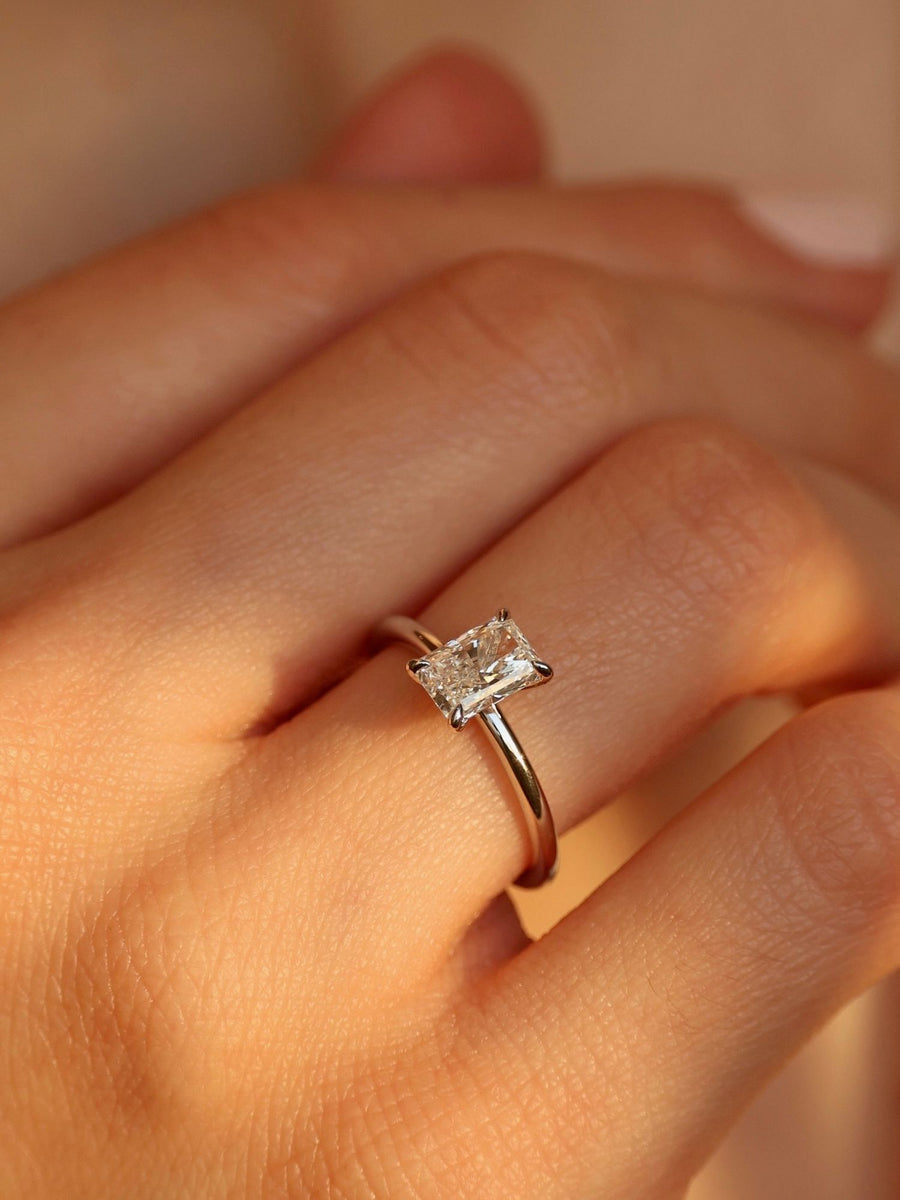 Radiant cut lab grown diamond solitaire engagement ring, 1.50 to 3.50 carats, in a classic prong setting on polished gold band