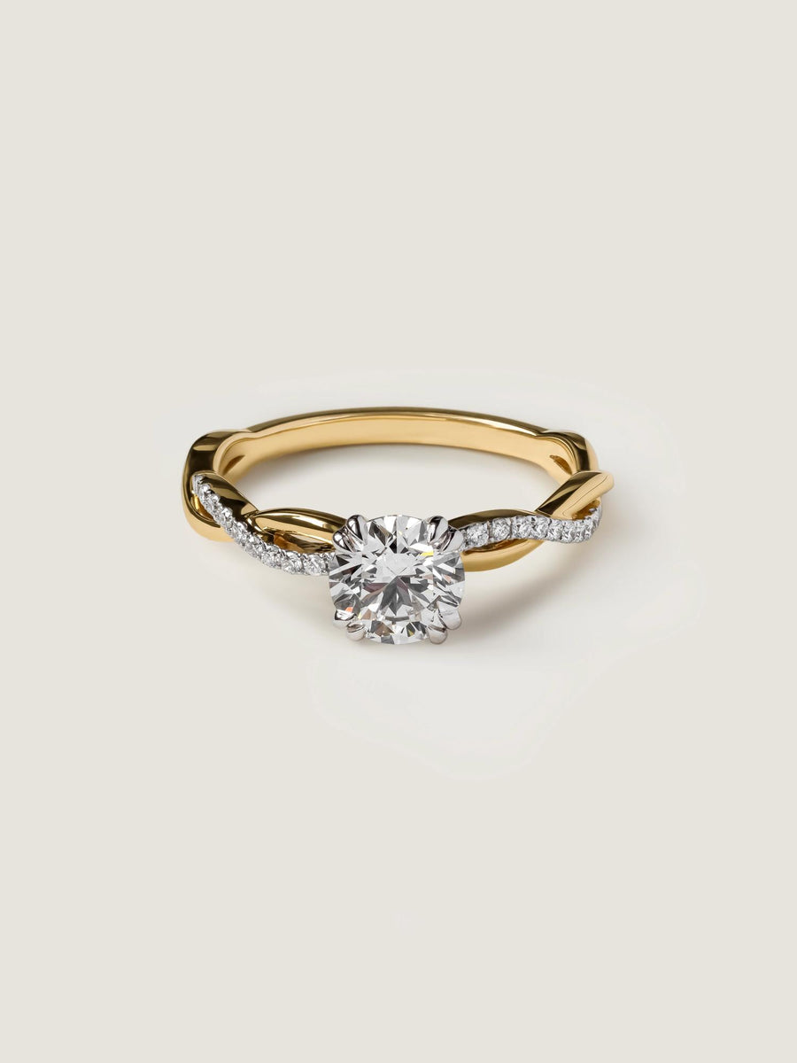 Round cut lab grown diamond twisted engagement ring, 0.70 to 2.50 carats, set in prong design with intertwined gold band