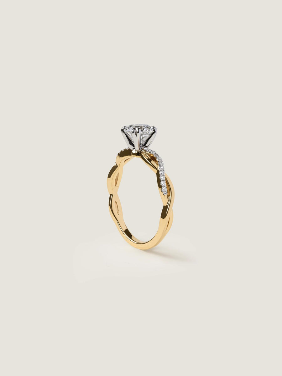 Round cut lab grown diamond twisted engagement ring, 0.70 to 2.50 carats, set in prong design with intertwined gold band