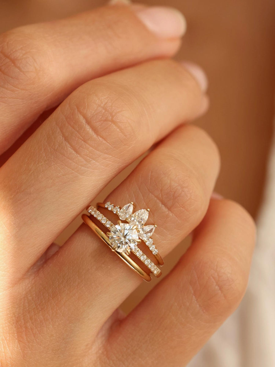 Round cut lab grown diamond pavé engagement ring, 0.75 to 2.75 carats, with side stones in elegant prong setting on polished gold band