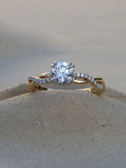 Round cut lab grown diamond twisted engagement ring, 0.70 to 2.50 carats, set in prong design with intertwined gold band