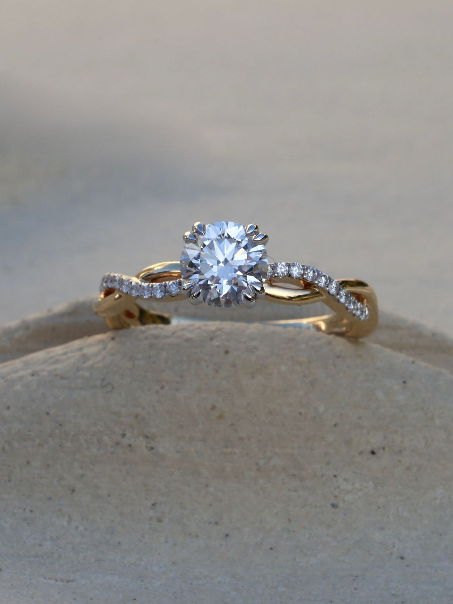 Round cut lab grown diamond twisted engagement ring, 0.70 to 2.50 carats, set in prong design with intertwined gold band