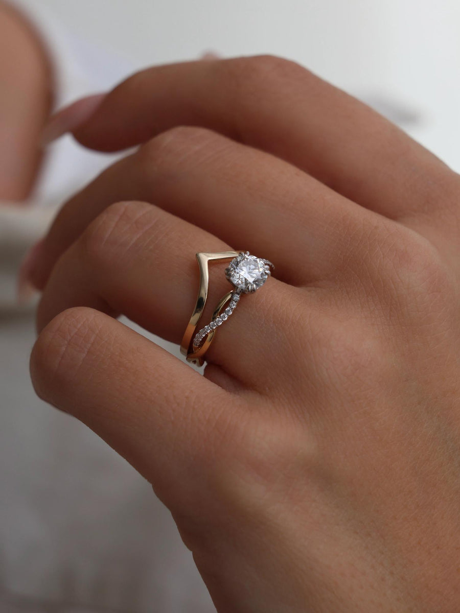 Round cut lab grown diamond twisted engagement ring, 0.70 to 2.50 carats, set in prong design with intertwined gold band