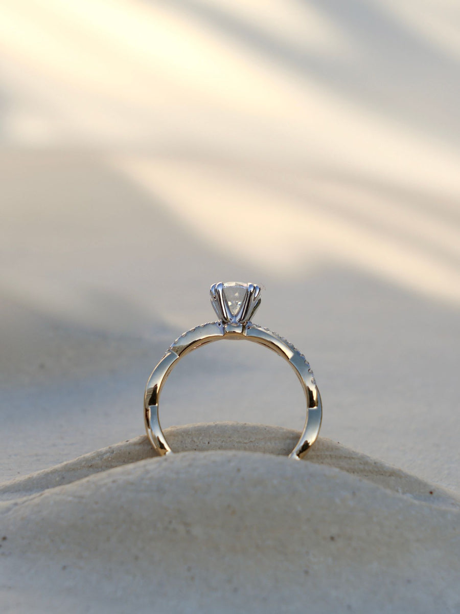 Round cut lab grown diamond twisted engagement ring, 0.70 to 2.50 carats, set in prong design with intertwined gold band