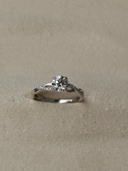 Round cut lab grown diamond twisted engagement ring, 0.70 to 2.50 carats, set in prong design with intertwined gold band