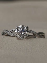 Round cut lab grown diamond twisted engagement ring, 0.70 to 2.50 carats, set in prong design with intertwined gold band
