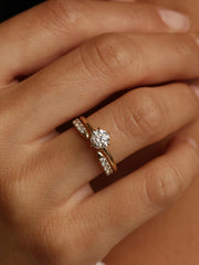 Round cut lab grown diamond solitaire engagement ring, 0.75 to 2.75 carats, set in a classic prong design on polished gold band