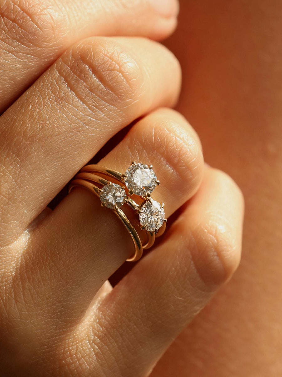 Round cut lab grown diamond solitaire engagement ring, 0.75 to 2.75 carats, set in a classic prong design on polished gold band