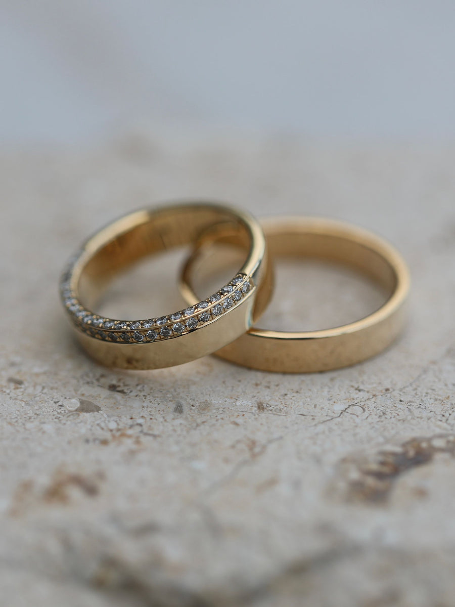 0.10 TCW Round Cut channel setting Wedding Band