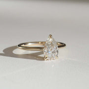 Pear cut lab grown diamond solitaire engagement ring, 1.5 to 3.5 carats, set in elegant prong setting on polished gold band