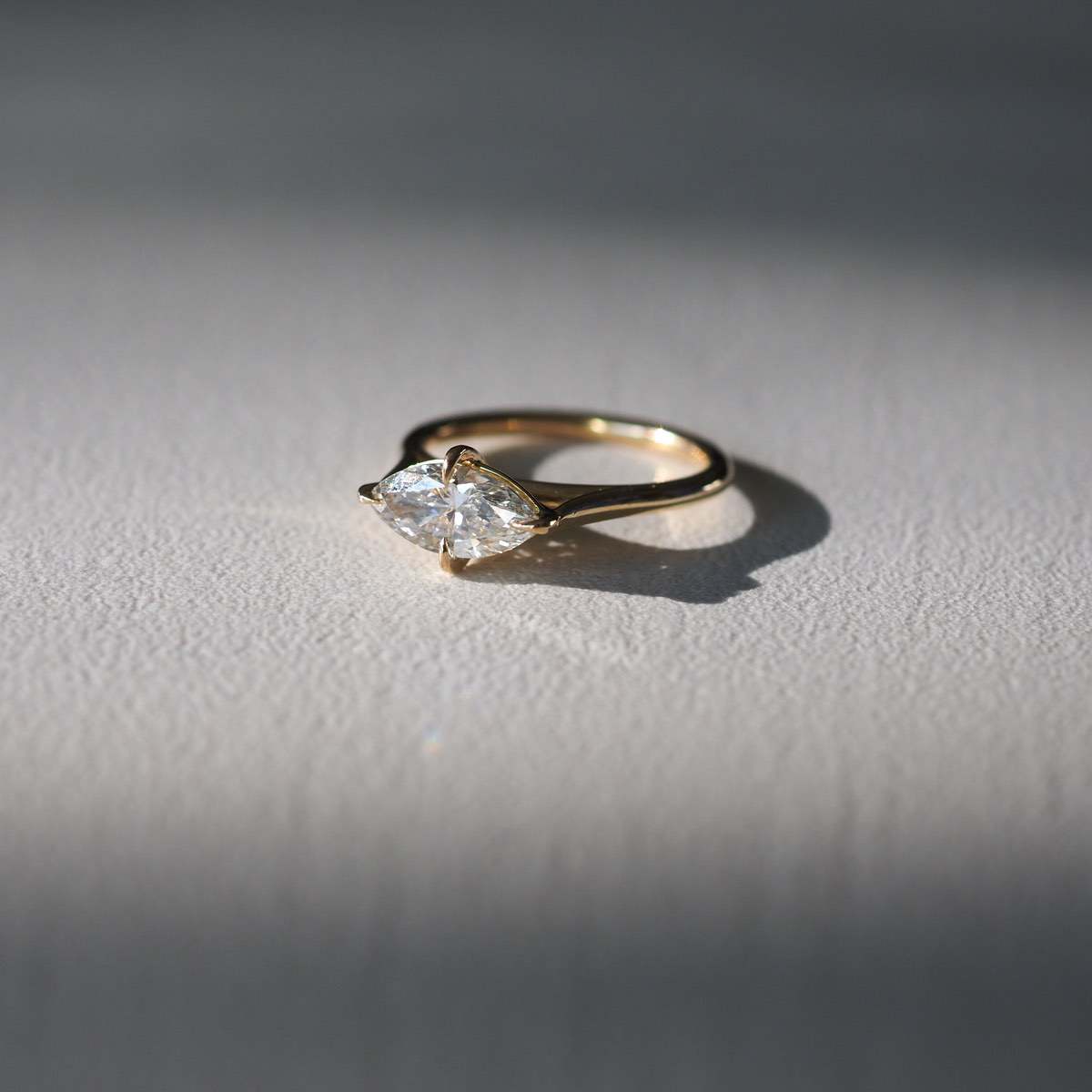 Marquise cut lab grown diamond solitaire engagement ring, 1.0 to 3.0 carats, set in classic prong design on polished gold band