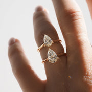 Pear cut lab grown diamond solitaire engagement ring, 1.5 to 3.5 carats, set in elegant prong setting on polished gold band