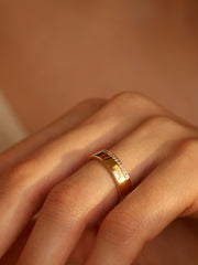 0.10 TCW Round Cut channel setting Wedding Band