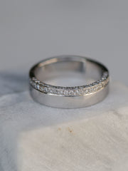 0.10 TCW Round Cut channel setting Wedding Band