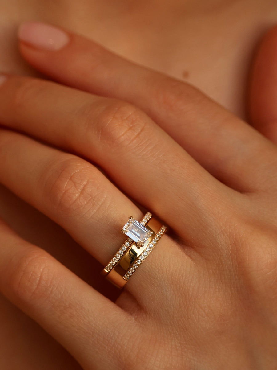 0.10 TCW Round Cut channel setting Wedding Band