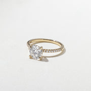 1.52 to 3.52 carat round lab grown diamond engagement ring with G/VS2 clarity and pave-set diamonds on a refined, polished band

