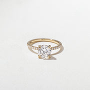 1.52 to 3.52 carat round lab grown diamond engagement ring with G/VS2 clarity and pave-set diamonds on a refined, polished band

