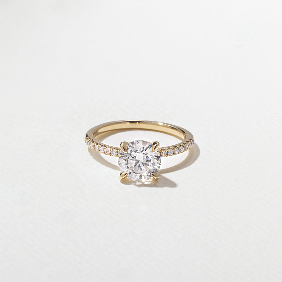 1.52 to 3.52 carat round lab grown diamond engagement ring with G/VS2 clarity and pave-set diamonds on a refined, polished band

