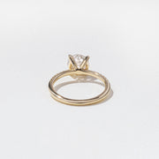 1.52 to 3.52 carat round lab grown diamond engagement ring with G/VS2 clarity and pave-set diamonds on a refined, polished band

