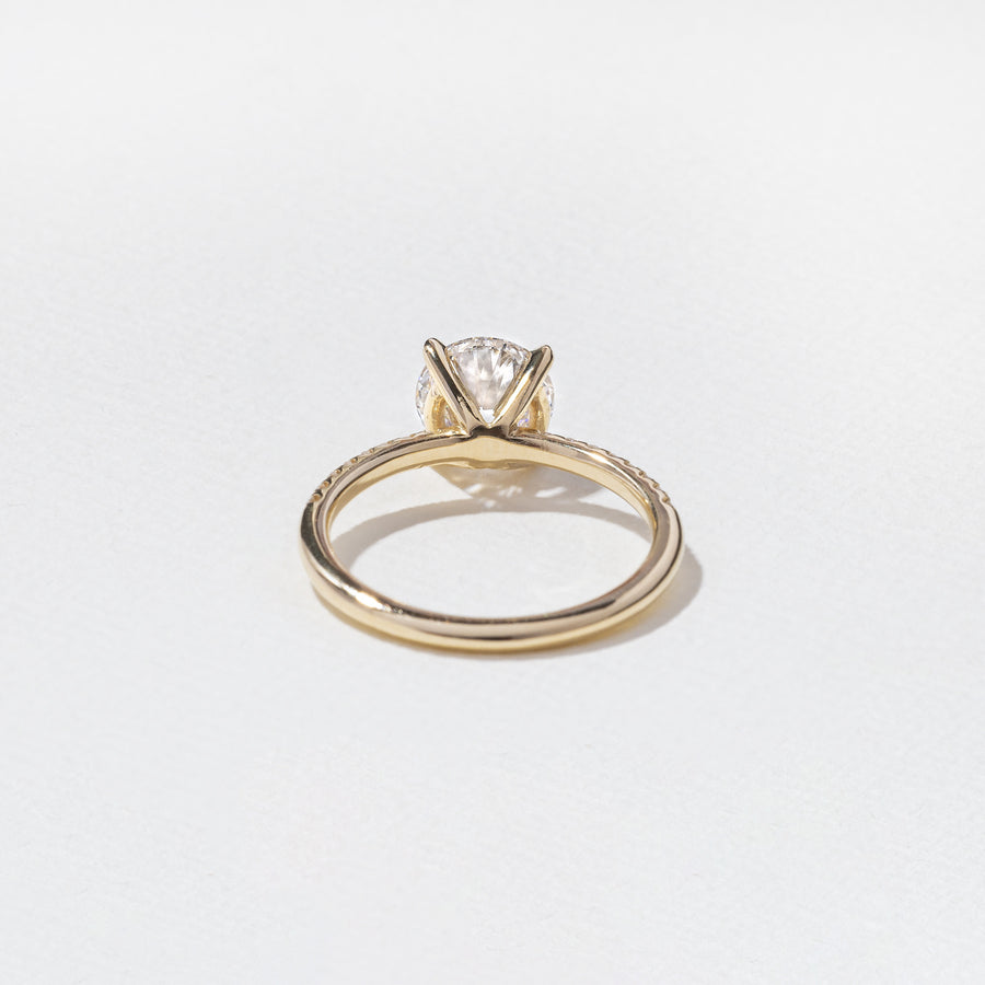 1.52 to 3.52 carat round lab grown diamond engagement ring with G/VS2 clarity and pave-set diamonds on a refined, polished band

