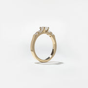 0.50 carat oval cut lab grown diamond five stone engagement ring in classic prong setting on polished gold band