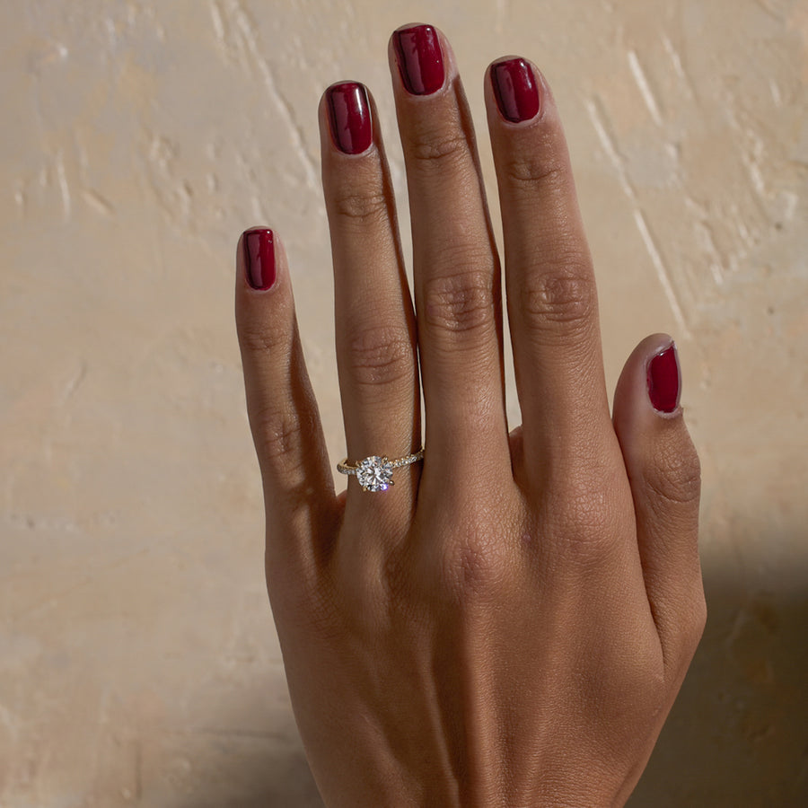 1.52 to 3.52 carat round lab grown diamond engagement ring with G/VS2 clarity and pave-set diamonds on a refined, polished band

