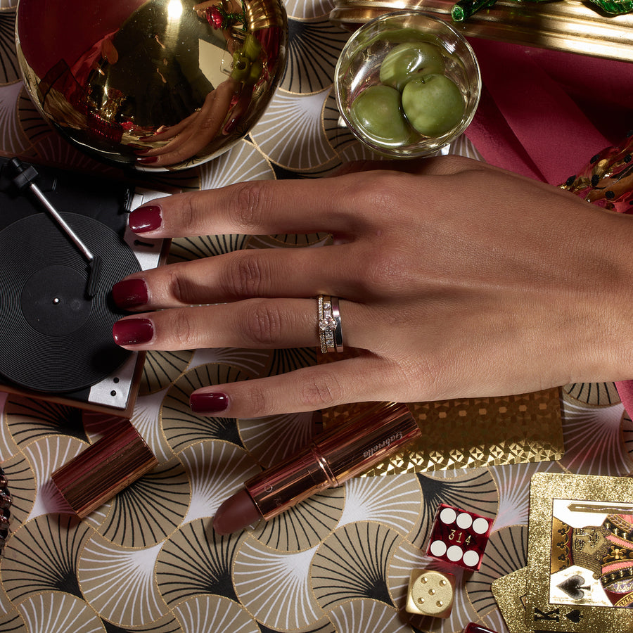 0.50 carat oval cut lab grown diamond five stone engagement ring in classic prong setting on polished gold band