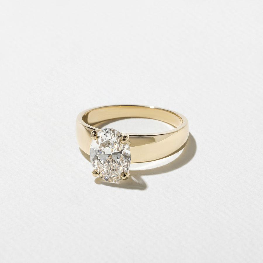 Oval cut lab grown diamond solitaire engagement ring, F/VS1 clarity, 1.75–3.75 carats, in elegant prong setting on polished metal band