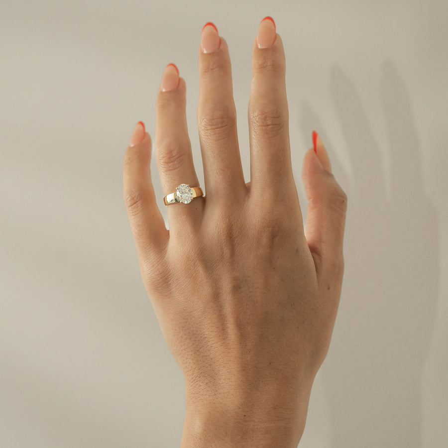 Oval cut lab grown diamond solitaire engagement ring, F/VS1 clarity, 1.75–3.75 carats, in elegant prong setting on polished metal band