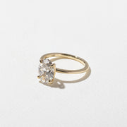 2.04 to 4.04 carat oval lab grown diamond solitaire ring in G/VS1 clarity set in a classic four-prong setting with polished metal band

