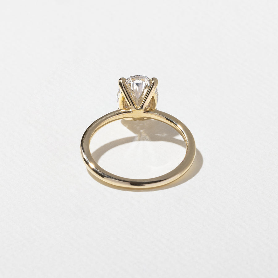 2.04 to 4.04 carat oval lab grown diamond solitaire ring in G/VS1 clarity set in a classic four-prong setting with polished metal band

