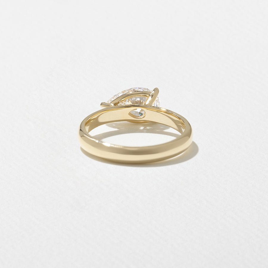 East-west set pear cut lab grown diamond solitaire engagement ring in G/VS1 clarity, 1.58 to 3.58 carats, with sleek prong setting