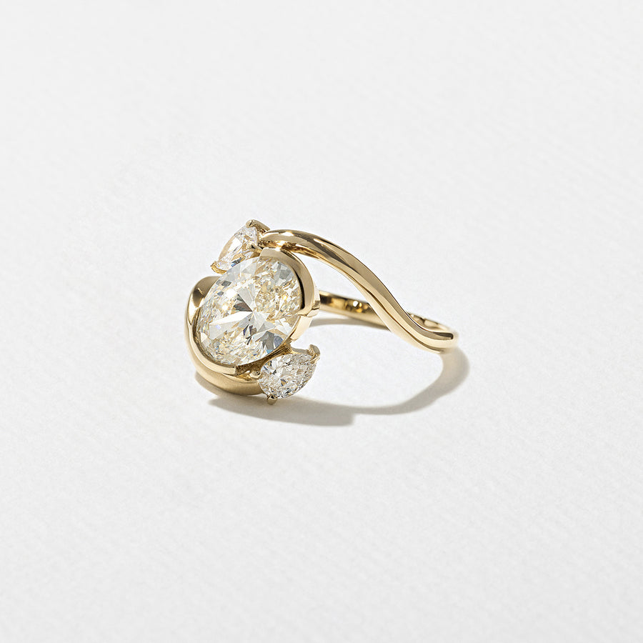 1.55 carat oval cut CVD lab grown diamond three stone engagement ring with G color and VS1 clarity