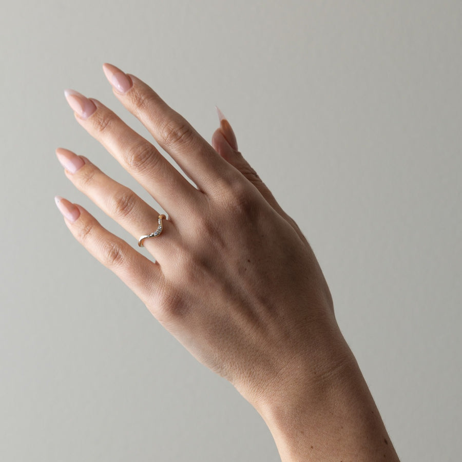 0.10 TCW Round Shape Unique Curved Wedding Band