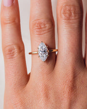 0.90 CT Marquise Cut Solitaire Moissanite Engagement Ring With Hidden Halo Setting - Barbara Maison 