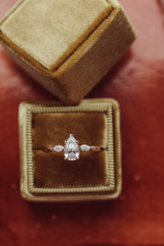 1.0 CT Pear Cut Three Stone Moissanite Engagement Ring - Barbara Maison 