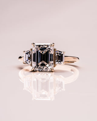 0.66 CT Emerald Cut Three Stone Moissanite Engagement Ring - Barbara Maison 