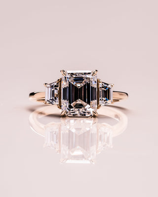 0.66 CT Emerald Cut Three Stone Moissanite Engagement Ring - Barbara Maison 