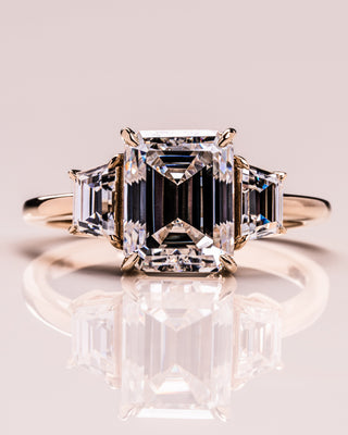 0.66 CT Emerald Cut Three Stone Moissanite Engagement Ring - Barbara Maison 