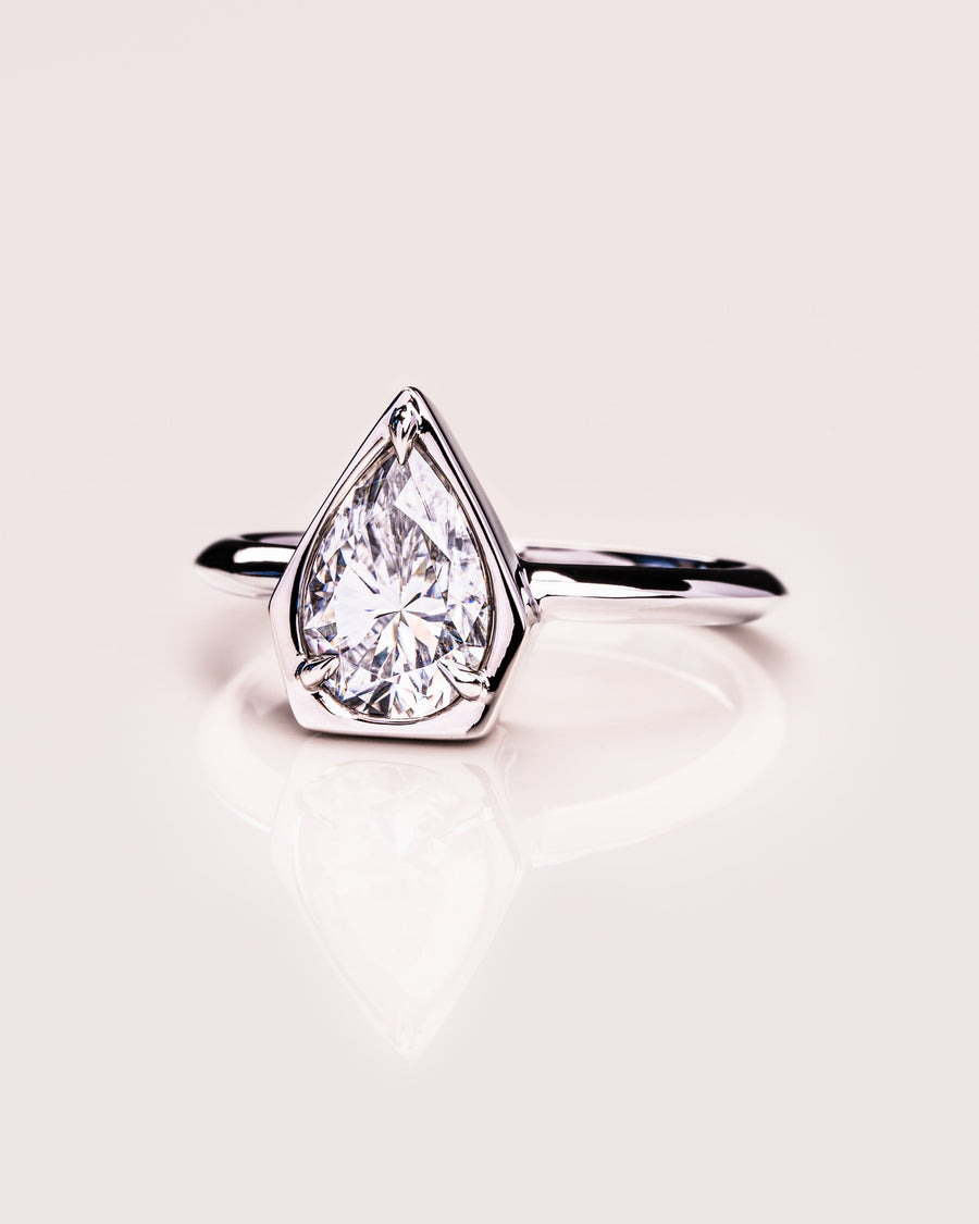 1.33 CT Pear Cut Bezel Solitaire Moissanite Engagement Ring - Barbara Maison 