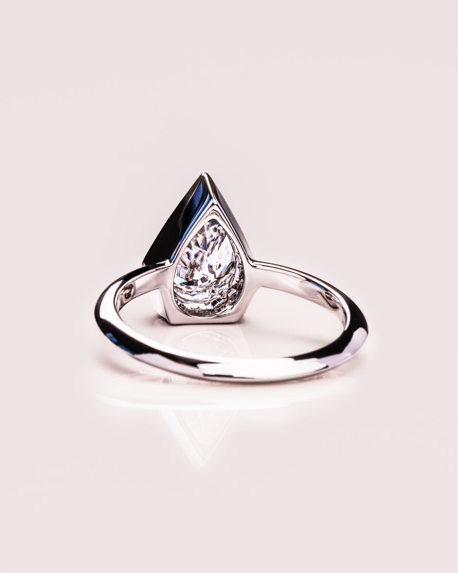 1.33 CT Pear Cut Bezel Solitaire Moissanite Engagement Ring - Barbara Maison 