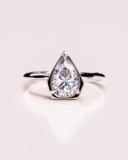 1.33 CT Pear Cut Bezel Solitaire Moissanite Engagement Ring - Barbara Maison 