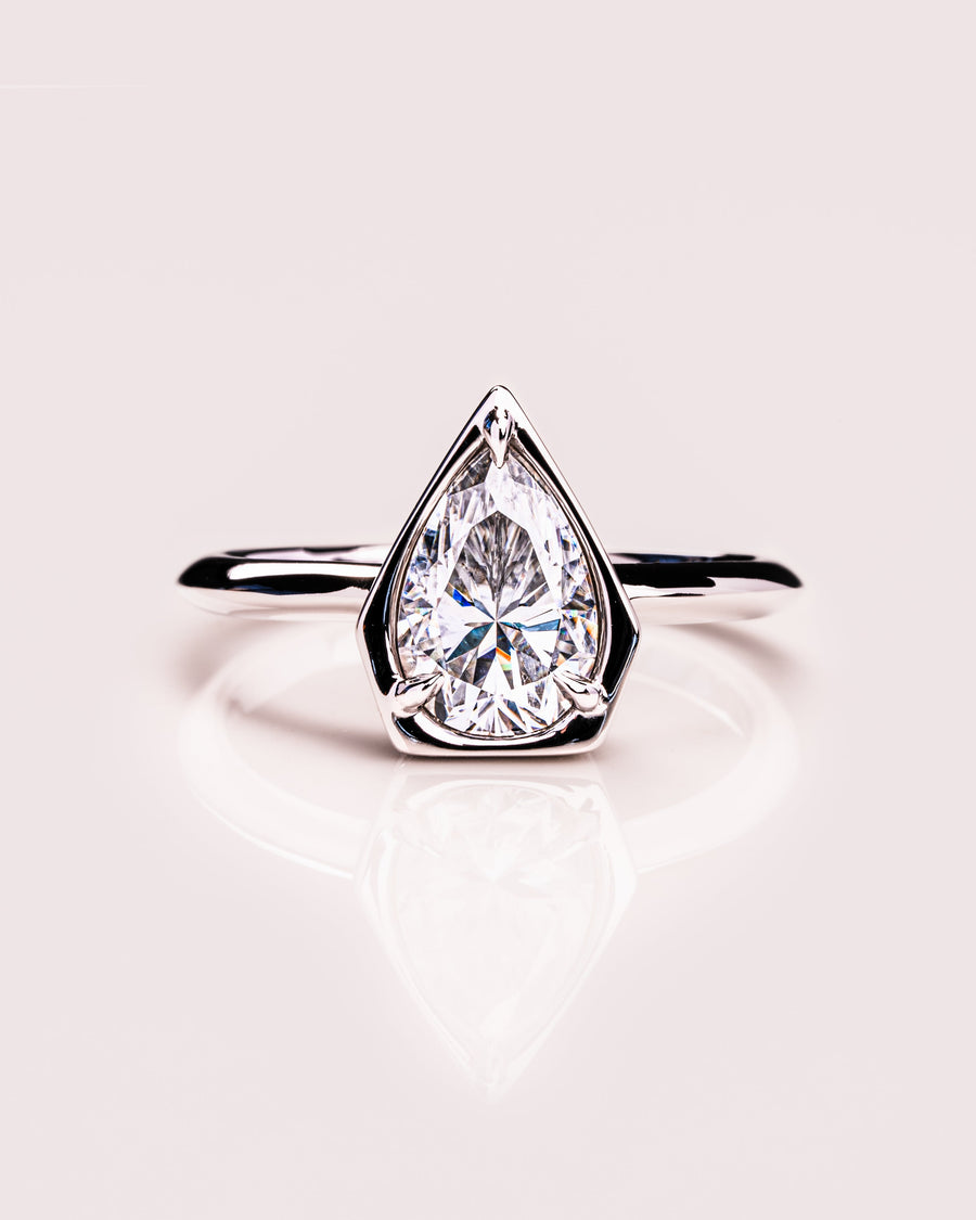 1.33 CT Pear Cut Bezel Solitaire Moissanite Engagement Ring - Barbara Maison 